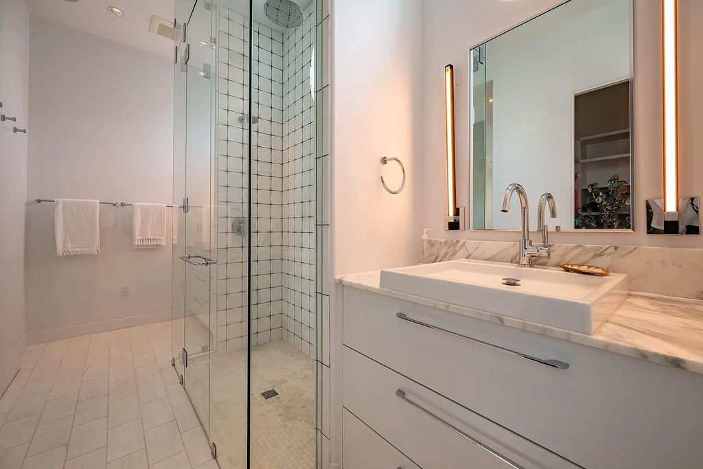 Discover modern living at its finest with this exquisite property at 62 S Charles Street, Inlet Beach, Florida. Built by Boheme Design in 2019, this architectural masterpiece offers 4 beds, 5 baths, and 3,845 sq ft of luxurious living space. Enjoy the peacefulness of Palmera Park and stunning outdoor areas, including a pool with a mesmerizing 32' water wall. Dual primary suites, a gourmet kitchen, and a media room with a wet bar elevate the living experience. Embrace the elegance, convenience, and serenity of this must-see home, complete with access to a private Beach Club.