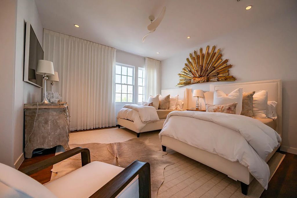 Discover modern living at its finest with this exquisite property at 62 S Charles Street, Inlet Beach, Florida. Built by Boheme Design in 2019, this architectural masterpiece offers 4 beds, 5 baths, and 3,845 sq ft of luxurious living space. Enjoy the peacefulness of Palmera Park and stunning outdoor areas, including a pool with a mesmerizing 32' water wall. Dual primary suites, a gourmet kitchen, and a media room with a wet bar elevate the living experience. Embrace the elegance, convenience, and serenity of this must-see home, complete with access to a private Beach Club.