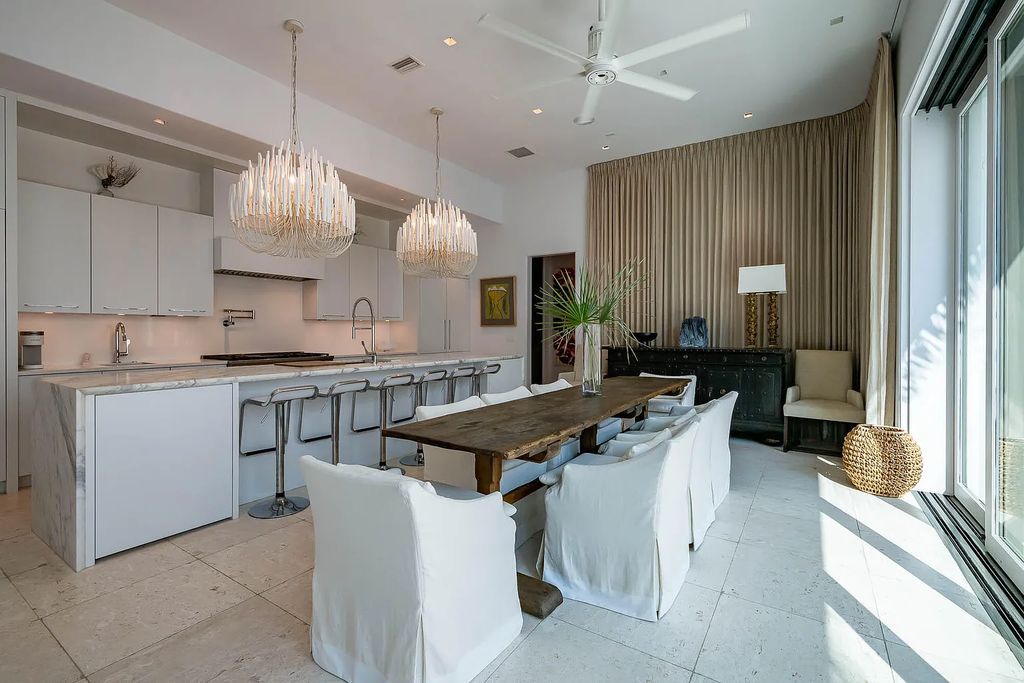 Discover modern living at its finest with this exquisite property at 62 S Charles Street, Inlet Beach, Florida. Built by Boheme Design in 2019, this architectural masterpiece offers 4 beds, 5 baths, and 3,845 sq ft of luxurious living space. Enjoy the peacefulness of Palmera Park and stunning outdoor areas, including a pool with a mesmerizing 32' water wall. Dual primary suites, a gourmet kitchen, and a media room with a wet bar elevate the living experience. Embrace the elegance, convenience, and serenity of this must-see home, complete with access to a private Beach Club.