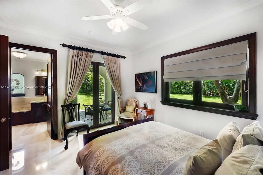 Welcome to Villa di Vista, an exquisite 6-bed, 7-bath masterpiece in  12500 Vista Lane, Pinecrest, Florida. With 7,536 sqft of luxury, high ceilings, and abundant natural light, this custom-built estate exudes charm