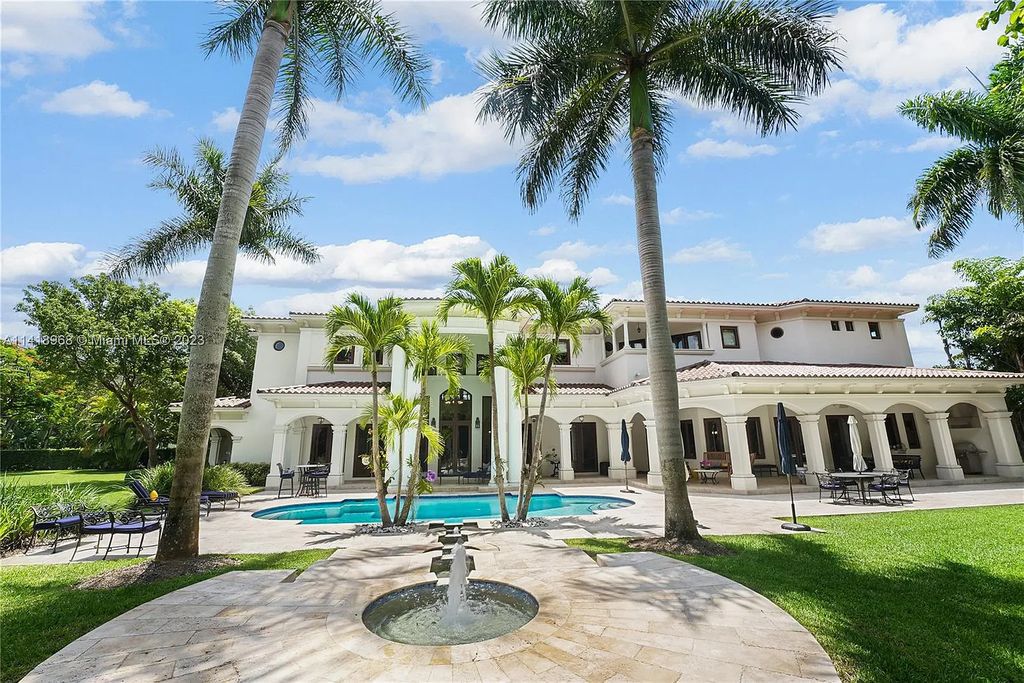 Welcome to Villa di Vista, an exquisite 6-bed, 7-bath masterpiece in  12500 Vista Lane, Pinecrest, Florida. With 7,536 sqft of luxury, high ceilings, and abundant natural light, this custom-built estate exudes charm