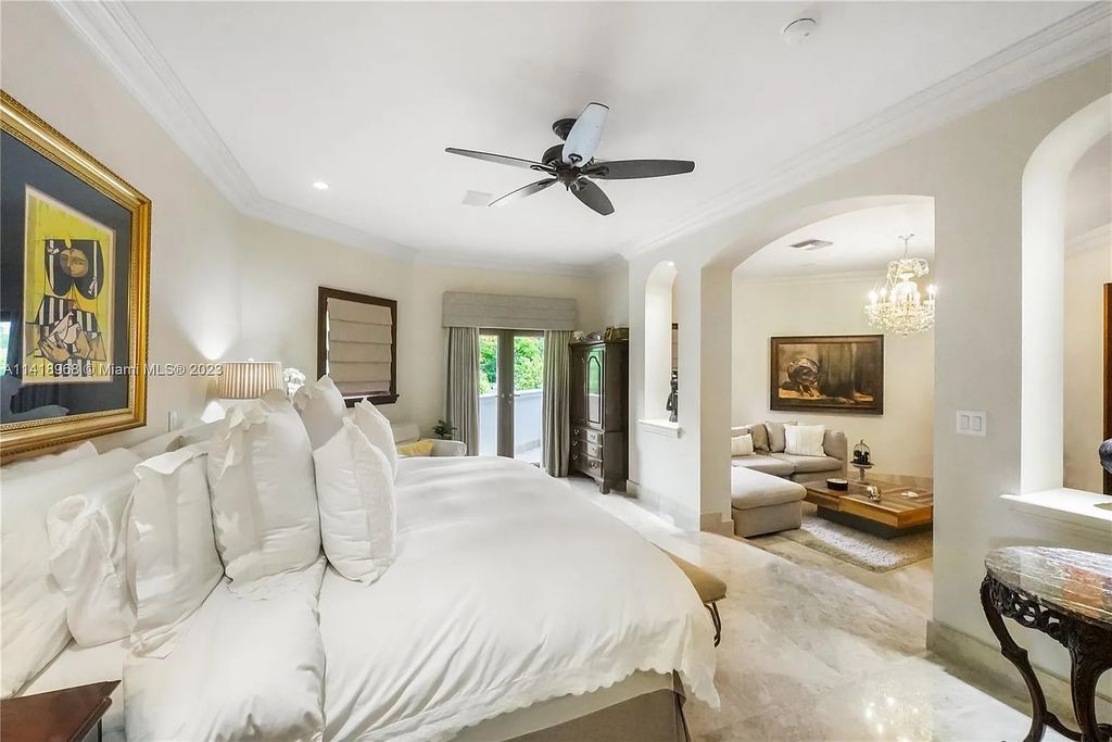 Welcome to Villa di Vista, an exquisite 6-bed, 7-bath masterpiece in  12500 Vista Lane, Pinecrest, Florida. With 7,536 sqft of luxury, high ceilings, and abundant natural light, this custom-built estate exudes charm