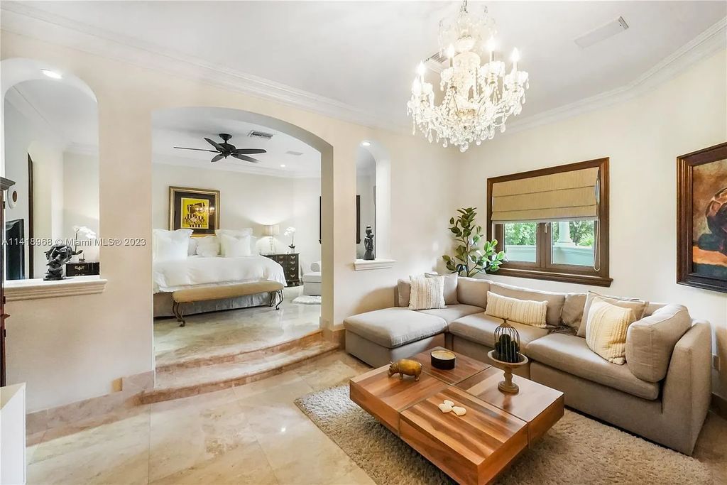 Welcome to Villa di Vista, an exquisite 6-bed, 7-bath masterpiece in  12500 Vista Lane, Pinecrest, Florida. With 7,536 sqft of luxury, high ceilings, and abundant natural light, this custom-built estate exudes charm