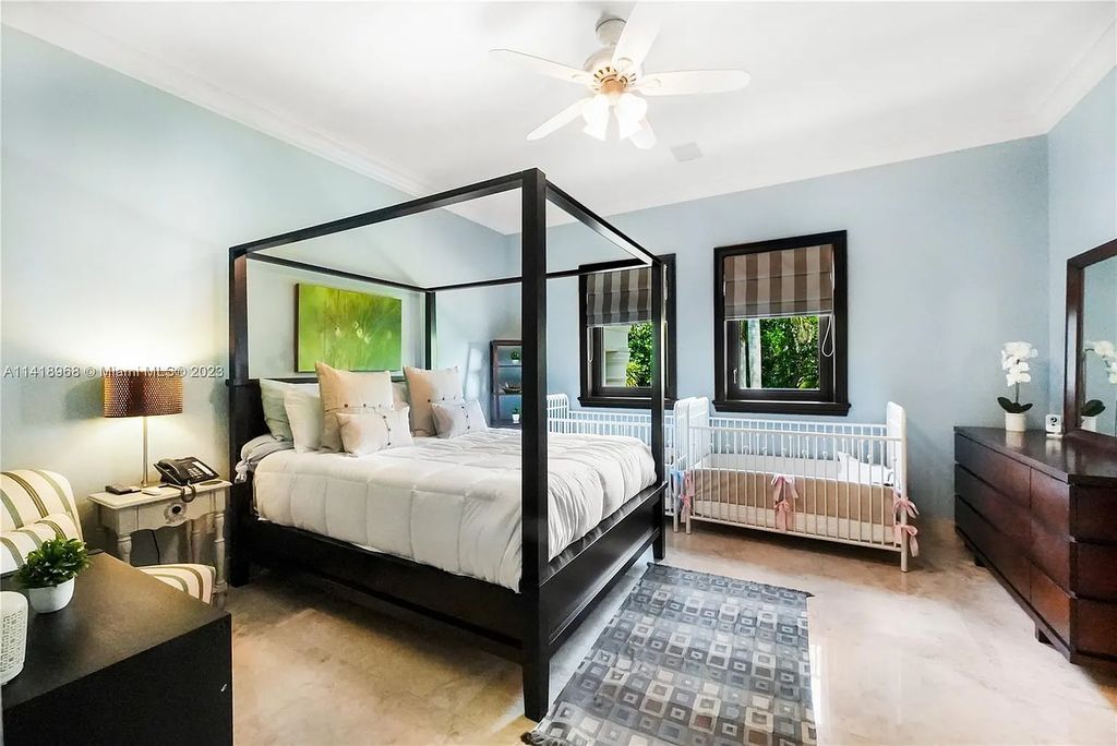 Welcome to Villa di Vista, an exquisite 6-bed, 7-bath masterpiece in  12500 Vista Lane, Pinecrest, Florida. With 7,536 sqft of luxury, high ceilings, and abundant natural light, this custom-built estate exudes charm