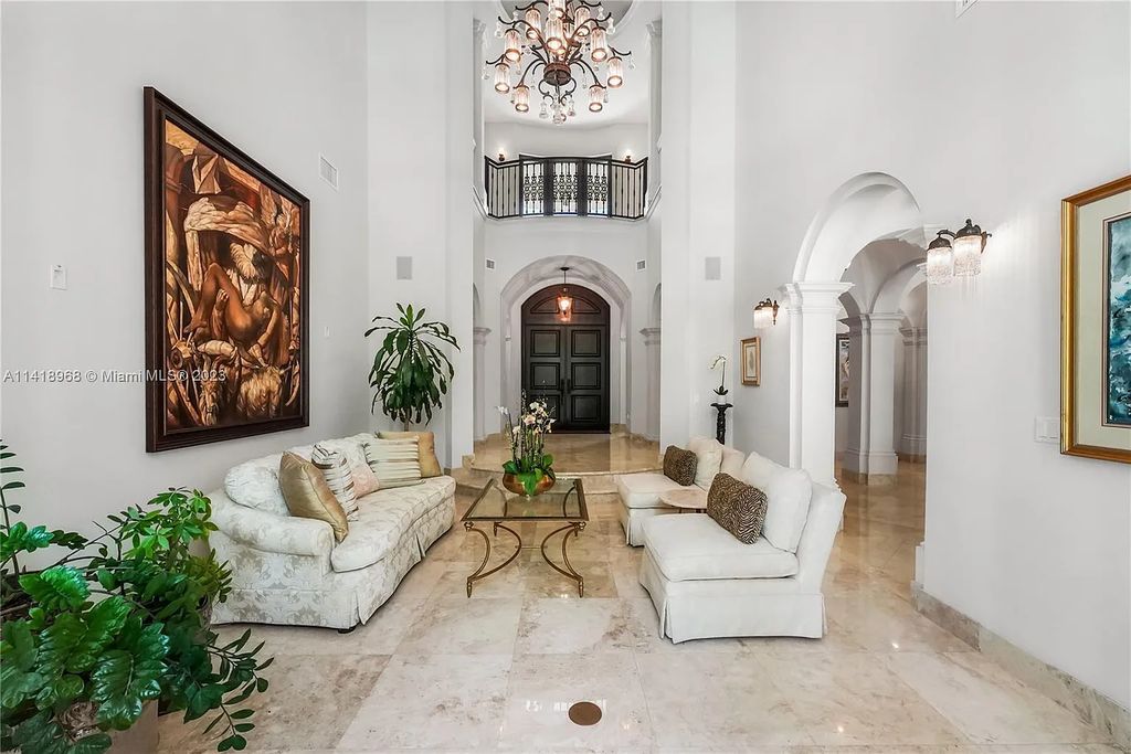 Welcome to Villa di Vista, an exquisite 6-bed, 7-bath masterpiece in  12500 Vista Lane, Pinecrest, Florida. With 7,536 sqft of luxury, high ceilings, and abundant natural light, this custom-built estate exudes charm