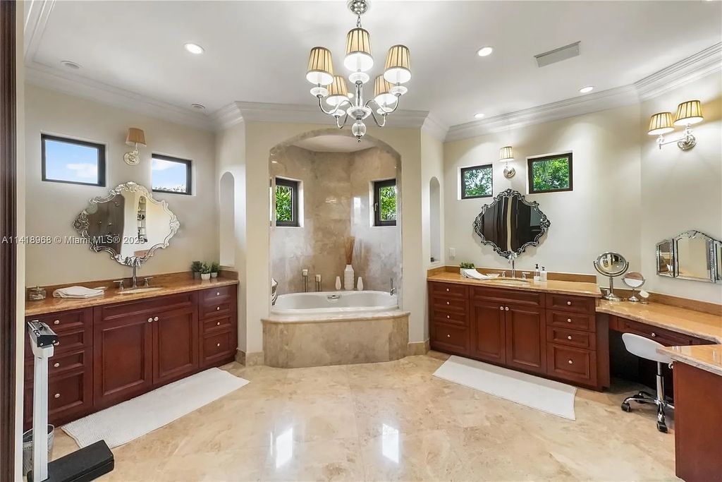 Welcome to Villa di Vista, an exquisite 6-bed, 7-bath masterpiece in  12500 Vista Lane, Pinecrest, Florida. With 7,536 sqft of luxury, high ceilings, and abundant natural light, this custom-built estate exudes charm