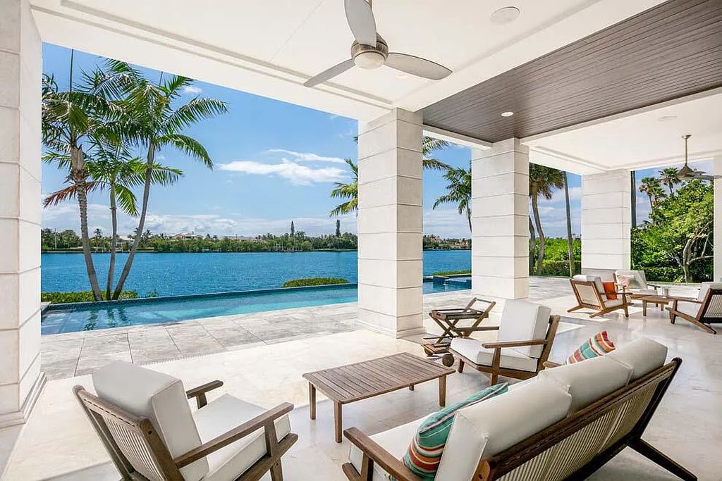 Experience the epitome of luxury living at 1540 Paslay Place, a stunning, like-new 5-bedroom estate in Manalapan, Florida.