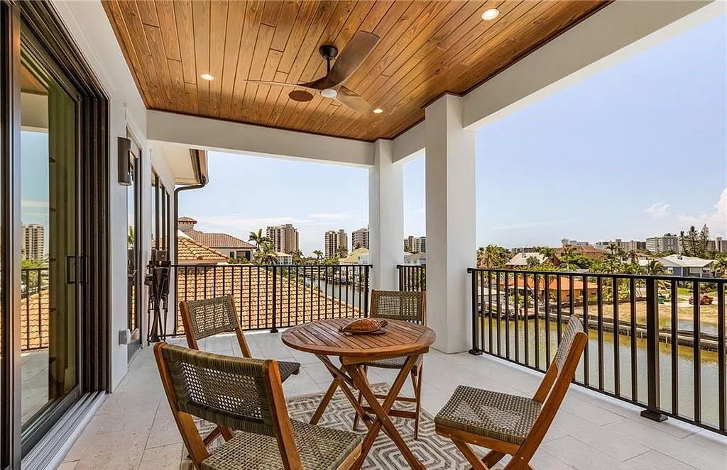 Experience the epitome of luxury living at 241 Egret Avenue, an impressive waterfront gulf access home in Naples, Florida. This newly built three-story residence boasts 5 bedrooms, 7 baths, and a wealth of upscale features.