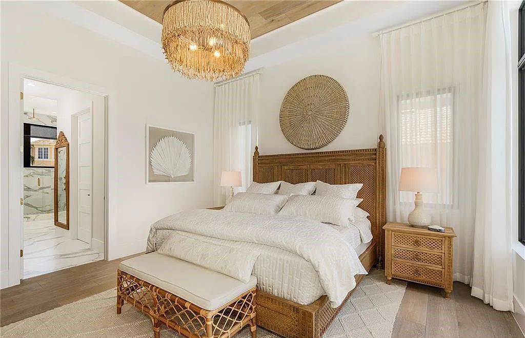 Experience the epitome of luxury living at 241 Egret Avenue, an impressive waterfront gulf access home in Naples, Florida. This newly built three-story residence boasts 5 bedrooms, 7 baths, and a wealth of upscale features.