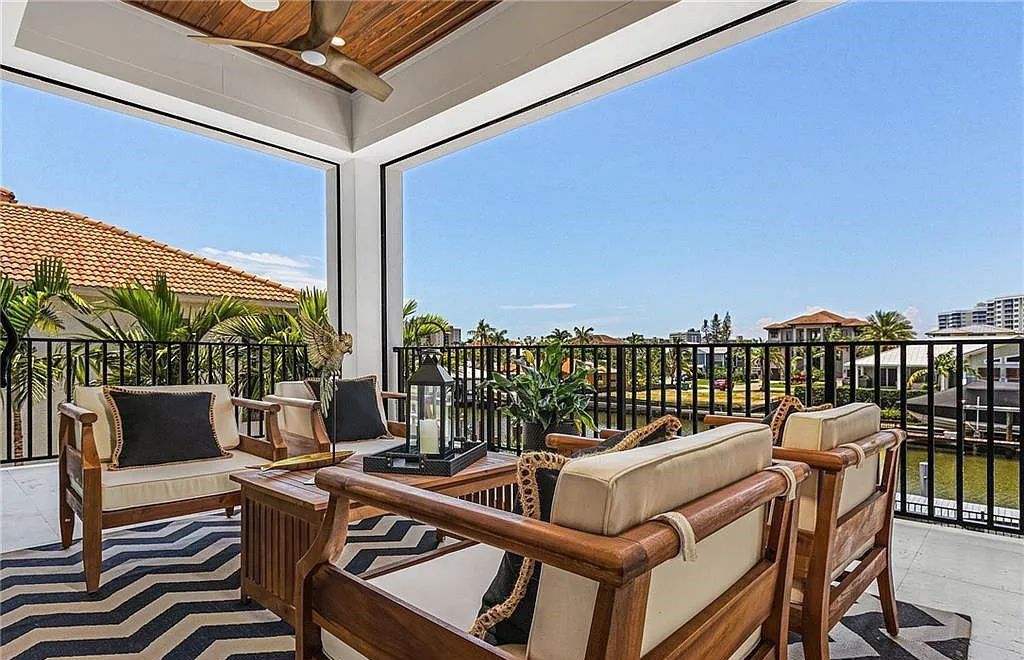 Experience the epitome of luxury living at 241 Egret Avenue, an impressive waterfront gulf access home in Naples, Florida. This newly built three-story residence boasts 5 bedrooms, 7 baths, and a wealth of upscale features.