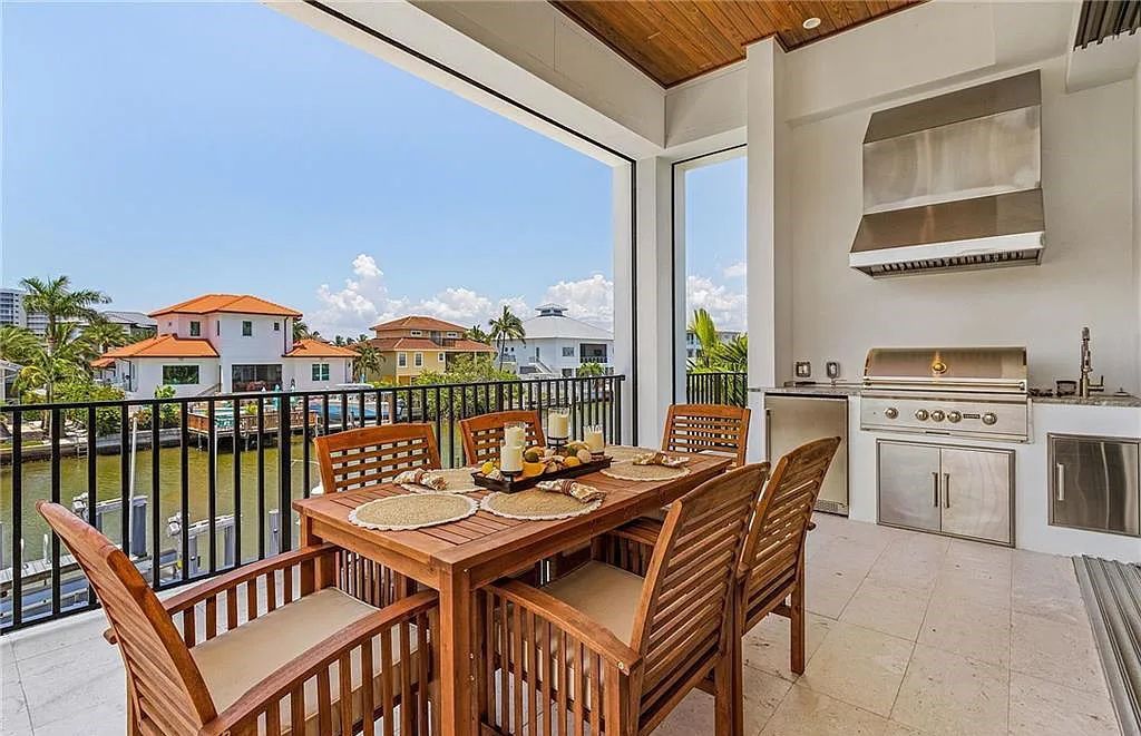 Experience the epitome of luxury living at 241 Egret Avenue, an impressive waterfront gulf access home in Naples, Florida. This newly built three-story residence boasts 5 bedrooms, 7 baths, and a wealth of upscale features.