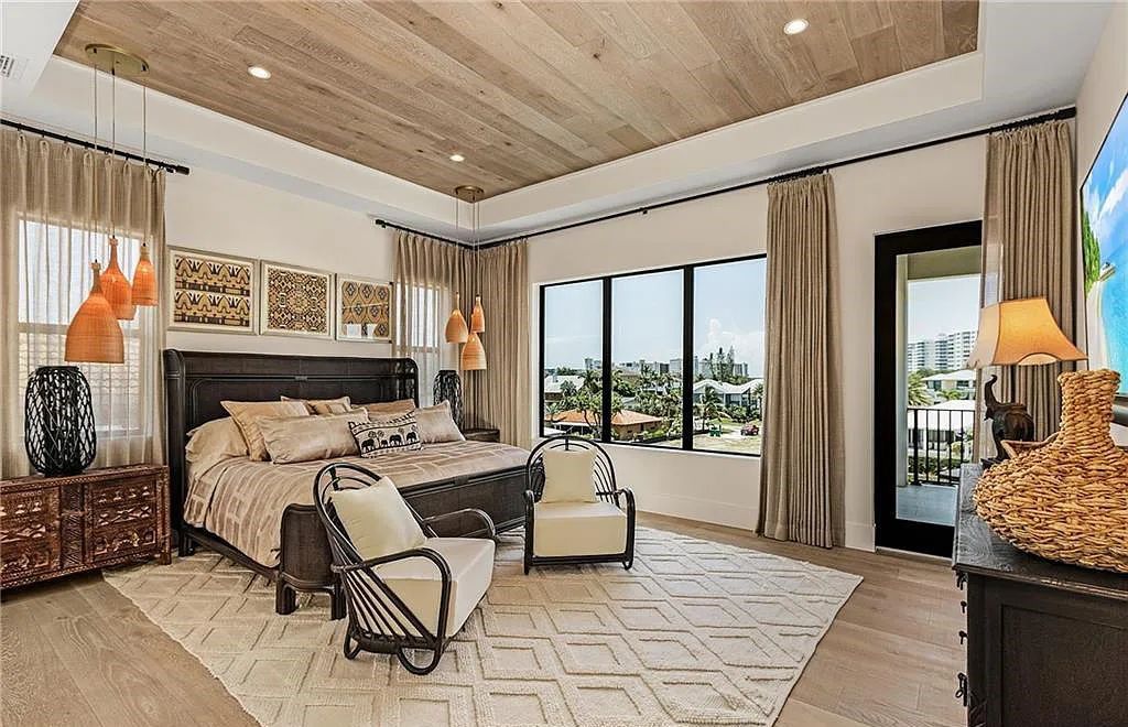 Experience the epitome of luxury living at 241 Egret Avenue, an impressive waterfront gulf access home in Naples, Florida. This newly built three-story residence boasts 5 bedrooms, 7 baths, and a wealth of upscale features.