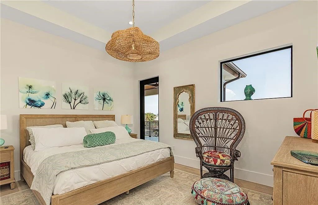 Experience the epitome of luxury living at 241 Egret Avenue, an impressive waterfront gulf access home in Naples, Florida. This newly built three-story residence boasts 5 bedrooms, 7 baths, and a wealth of upscale features.