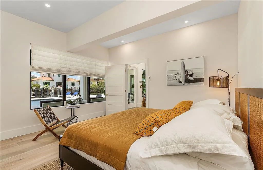 Experience the epitome of luxury living at 241 Egret Avenue, an impressive waterfront gulf access home in Naples, Florida. This newly built three-story residence boasts 5 bedrooms, 7 baths, and a wealth of upscale features.
