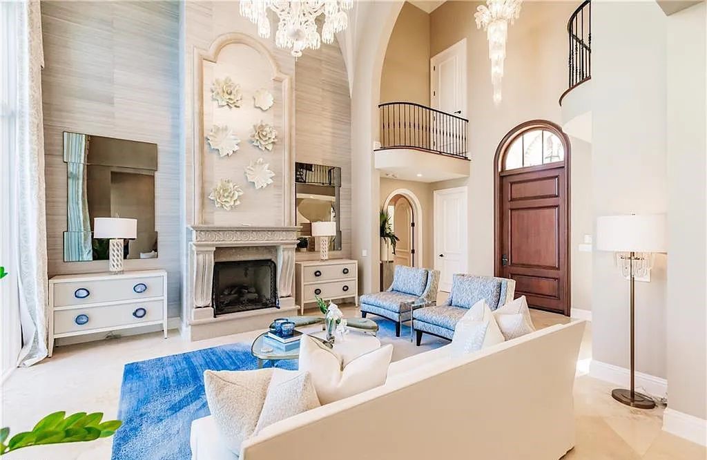 Discover the ultimate Naples, Florida retreat at 2450 Tarpon Road, "The Gateway to Naples Bay." This exceptional property offers a luxurious 4+den/4.5 bath home with 4,450 square feet of living space, recently re-decorated and furnished by Clive Daniel