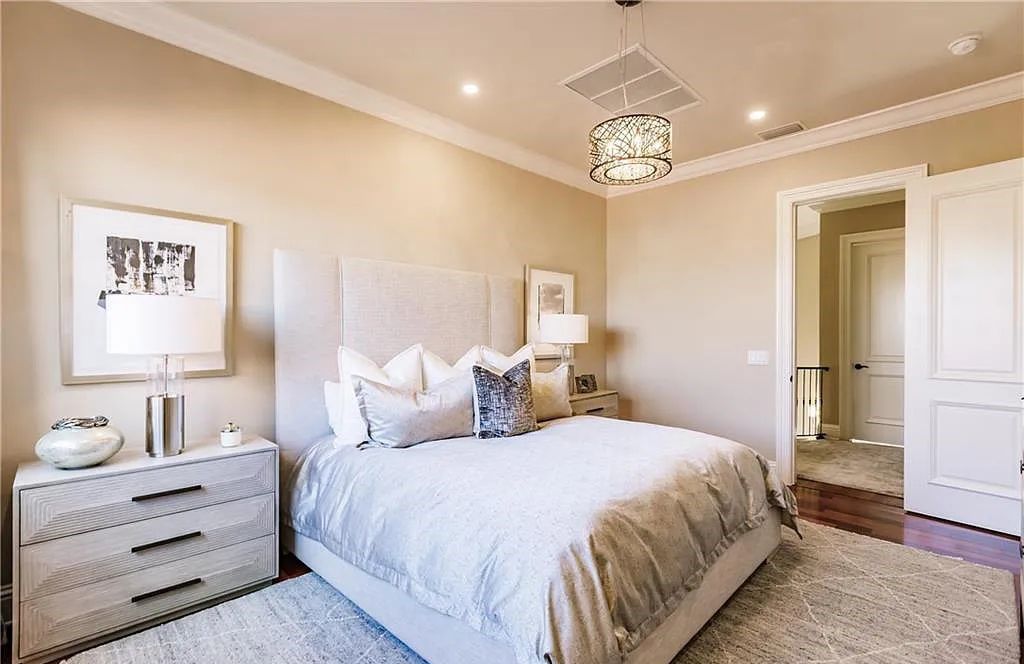 Discover the ultimate Naples, Florida retreat at 2450 Tarpon Road, "The Gateway to Naples Bay." This exceptional property offers a luxurious 4+den/4.5 bath home with 4,450 square feet of living space, recently re-decorated and furnished by Clive Daniel