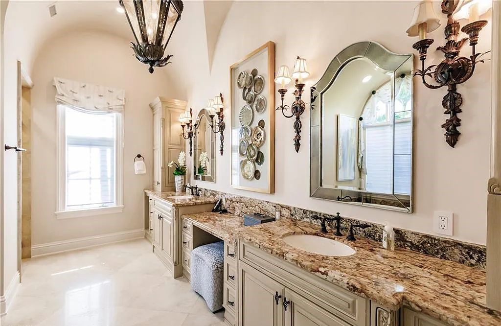 Discover the ultimate Naples, Florida retreat at 2450 Tarpon Road, "The Gateway to Naples Bay." This exceptional property offers a luxurious 4+den/4.5 bath home with 4,450 square feet of living space, recently re-decorated and furnished by Clive Daniel