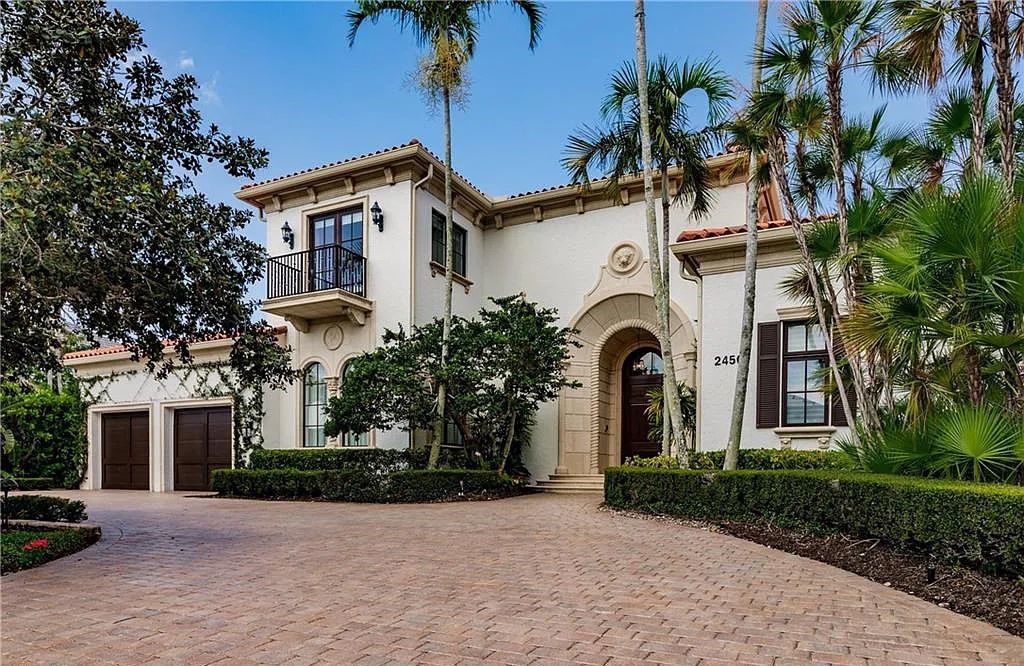 Discover the ultimate Naples, Florida retreat at 2450 Tarpon Road, "The Gateway to Naples Bay." This exceptional property offers a luxurious 4+den/4.5 bath home with 4,450 square feet of living space, recently re-decorated and furnished by Clive Daniel