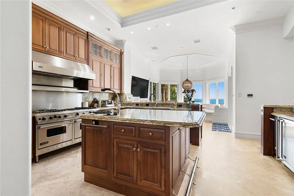 Discover the OLD RIOMAR OCEANFRONT ESTATE at 1736 Ocean Drive, Vero Beach, Florida. This grand home offers 6 bedrooms, 8.5 bathrooms, gym, resort-style pool, and a 2,000+ SF garage within its 12,500 SF area, set on a 0.66-acre lot with stunning views of the Atlantic.