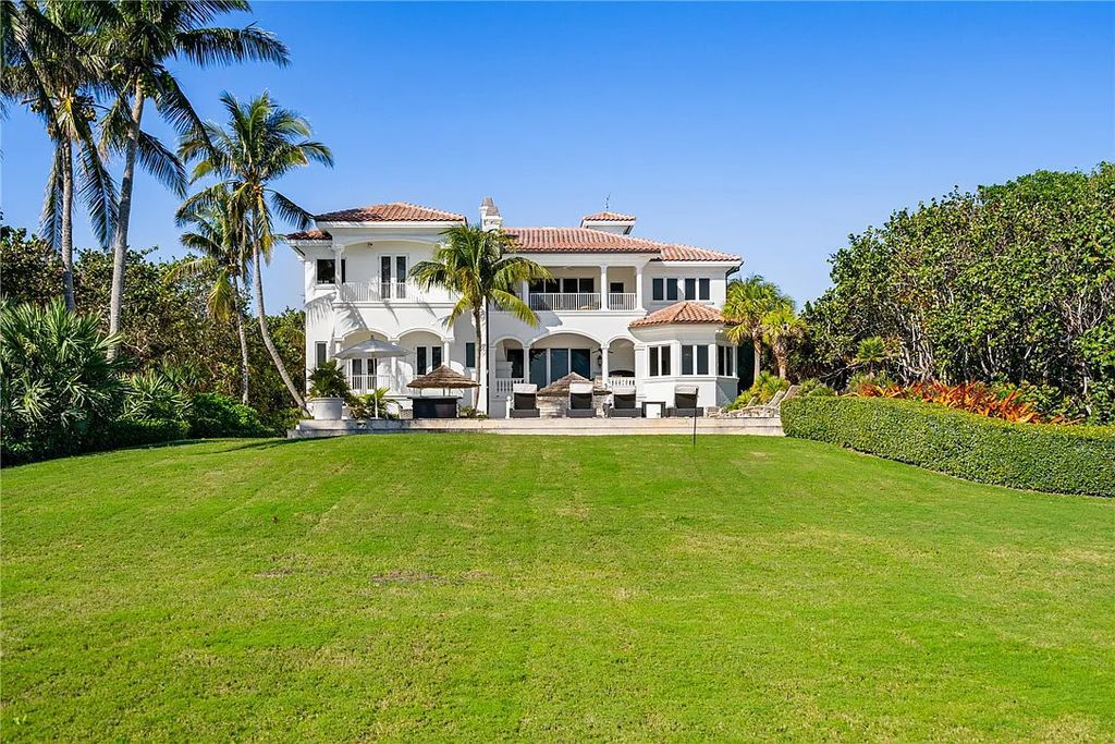 Discover the OLD RIOMAR OCEANFRONT ESTATE at 1736 Ocean Drive, Vero Beach, Florida. This grand home offers 6 bedrooms, 8.5 bathrooms, gym, resort-style pool, and a 2,000+ SF garage within its 12,500 SF area, set on a 0.66-acre lot with stunning views of the Atlantic.