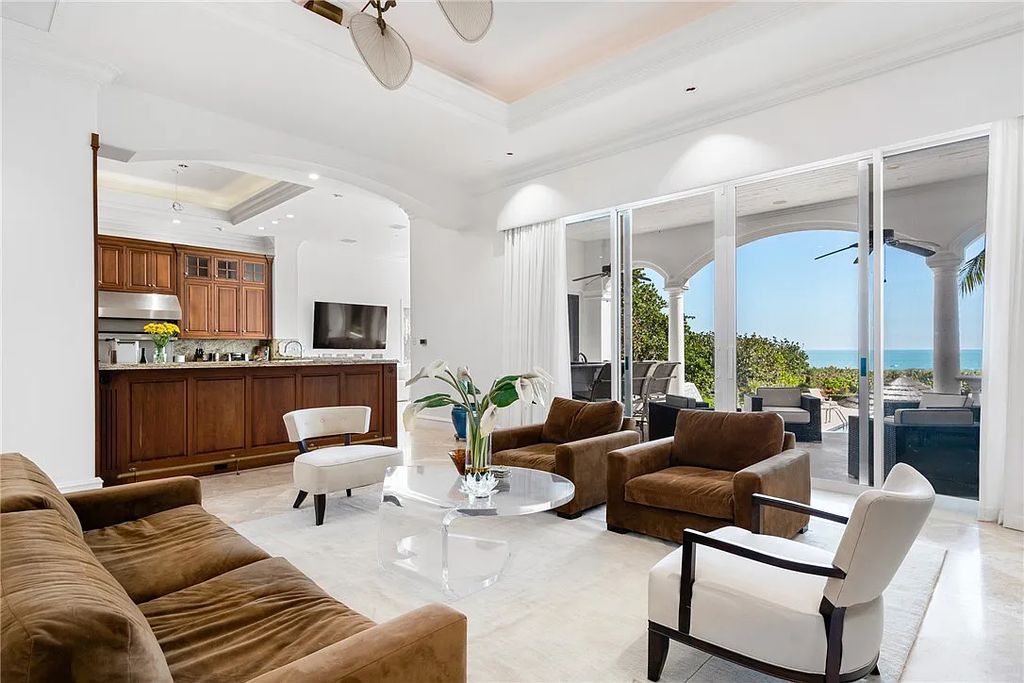 Discover the OLD RIOMAR OCEANFRONT ESTATE at 1736 Ocean Drive, Vero Beach, Florida. This grand home offers 6 bedrooms, 8.5 bathrooms, gym, resort-style pool, and a 2,000+ SF garage within its 12,500 SF area, set on a 0.66-acre lot with stunning views of the Atlantic.