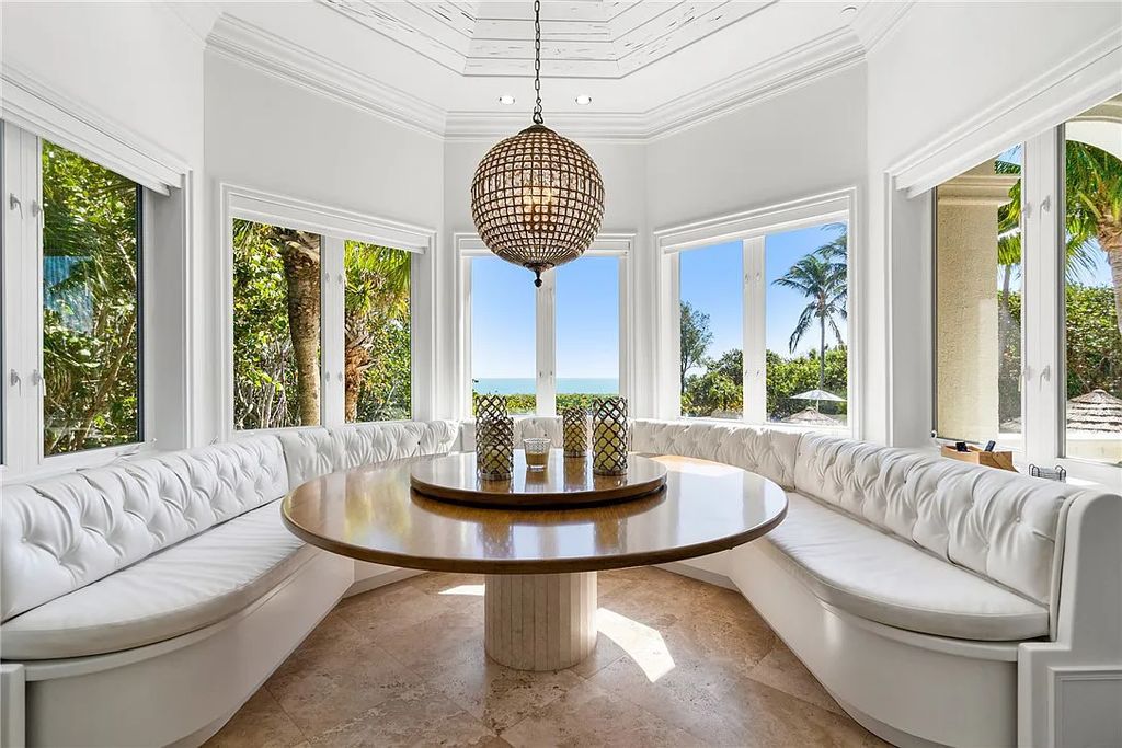 Discover the OLD RIOMAR OCEANFRONT ESTATE at 1736 Ocean Drive, Vero Beach, Florida. This grand home offers 6 bedrooms, 8.5 bathrooms, gym, resort-style pool, and a 2,000+ SF garage within its 12,500 SF area, set on a 0.66-acre lot with stunning views of the Atlantic.