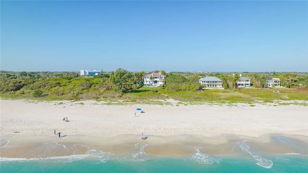 Discover the OLD RIOMAR OCEANFRONT ESTATE at 1736 Ocean Drive, Vero Beach, Florida. This grand home offers 6 bedrooms, 8.5 bathrooms, gym, resort-style pool, and a 2,000+ SF garage within its 12,500 SF area, set on a 0.66-acre lot with stunning views of the Atlantic.