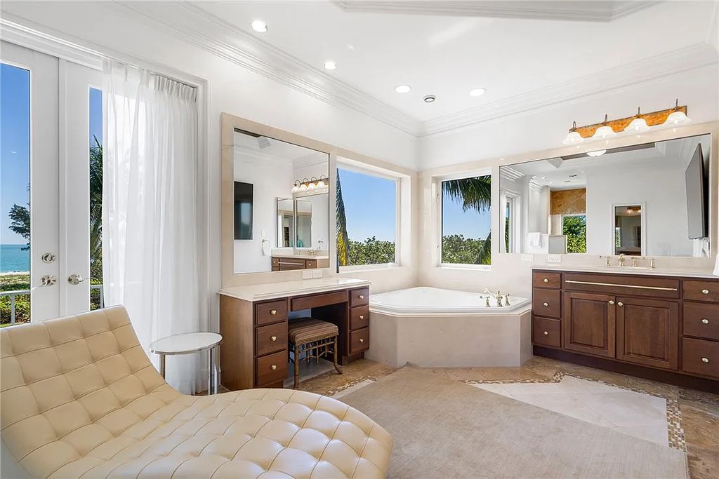 Discover the OLD RIOMAR OCEANFRONT ESTATE at 1736 Ocean Drive, Vero Beach, Florida. This grand home offers 6 bedrooms, 8.5 bathrooms, gym, resort-style pool, and a 2,000+ SF garage within its 12,500 SF area, set on a 0.66-acre lot with stunning views of the Atlantic.