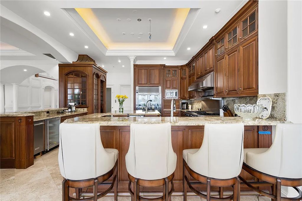 Discover the OLD RIOMAR OCEANFRONT ESTATE at 1736 Ocean Drive, Vero Beach, Florida. This grand home offers 6 bedrooms, 8.5 bathrooms, gym, resort-style pool, and a 2,000+ SF garage within its 12,500 SF area, set on a 0.66-acre lot with stunning views of the Atlantic.