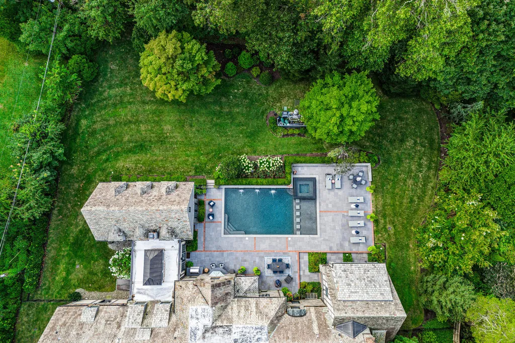 1 Blakeley Road Home in Haverford, Pennsylvania. Step into the elegance of the 1930s with this captivating residence nestled in the sought-after Merion Golf neighborhood. Meticulously renovated with sophistication, the home boasts beautiful materials, exquisite craftsmanship, and luminous designs throughout. 
