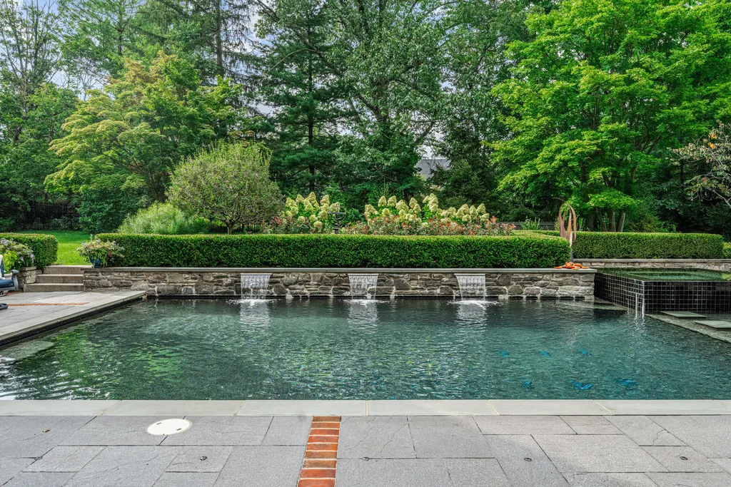 1 Blakeley Road Home in Haverford, Pennsylvania. Step into the elegance of the 1930s with this captivating residence nestled in the sought-after Merion Golf neighborhood. Meticulously renovated with sophistication, the home boasts beautiful materials, exquisite craftsmanship, and luminous designs throughout. 