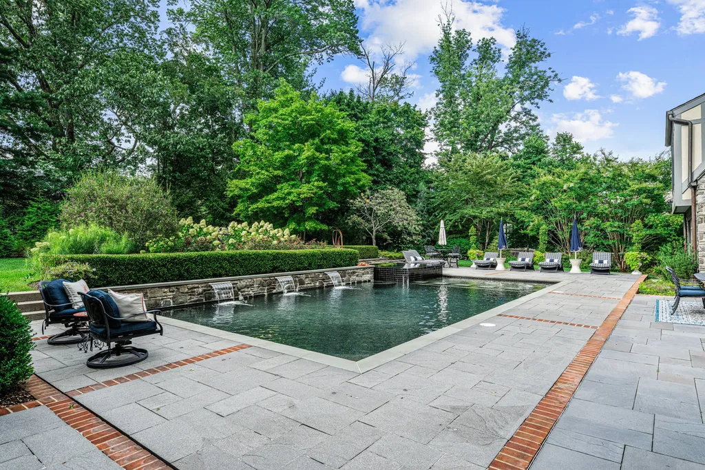 1 Blakeley Road Home in Haverford, Pennsylvania. Step into the elegance of the 1930s with this captivating residence nestled in the sought-after Merion Golf neighborhood. Meticulously renovated with sophistication, the home boasts beautiful materials, exquisite craftsmanship, and luminous designs throughout. 