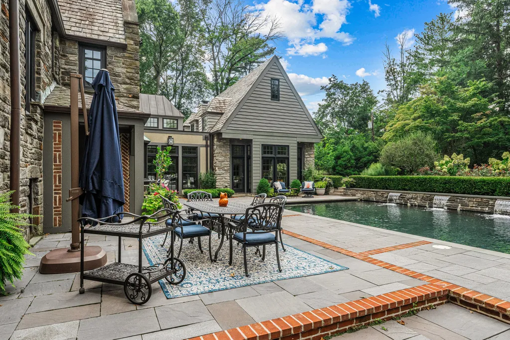 1 Blakeley Road Home in Haverford, Pennsylvania. Step into the elegance of the 1930s with this captivating residence nestled in the sought-after Merion Golf neighborhood. Meticulously renovated with sophistication, the home boasts beautiful materials, exquisite craftsmanship, and luminous designs throughout. 