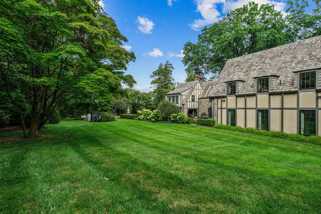 1 Blakeley Road Home in Haverford, Pennsylvania. Step into the elegance of the 1930s with this captivating residence nestled in the sought-after Merion Golf neighborhood. Meticulously renovated with sophistication, the home boasts beautiful materials, exquisite craftsmanship, and luminous designs throughout. 