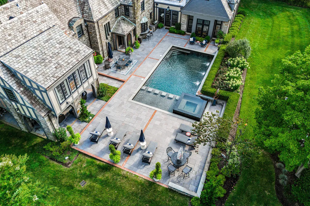 1 Blakeley Road Home in Haverford, Pennsylvania. Step into the elegance of the 1930s with this captivating residence nestled in the sought-after Merion Golf neighborhood. Meticulously renovated with sophistication, the home boasts beautiful materials, exquisite craftsmanship, and luminous designs throughout. 