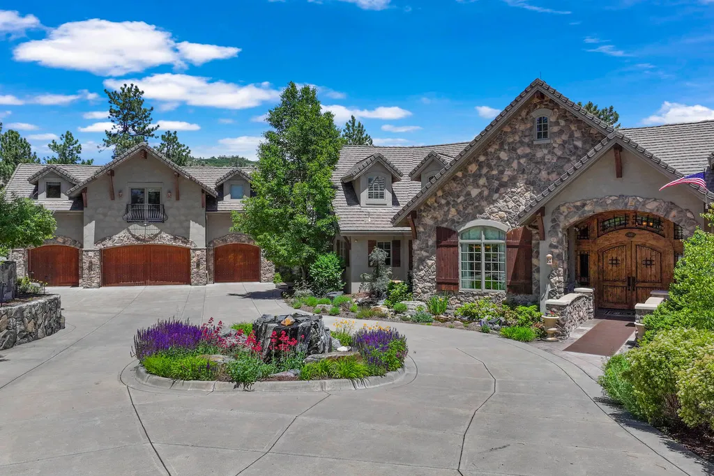 102 Coulter Place Home in Castle Rock, Colorado. Discover the elegance and serenity of 102 Coulter Place, a magnificent 4-bed, 8-bath custom home situated in the highly sought-after Village at Castle Pines. Nestled on a quiet cul-de-sac and overlooking the 1st green of Castle Pines Golf Club, this stately residence offers unparalleled golf course views from 7 patios and decks. 