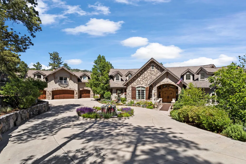 102 Coulter Place Home in Castle Rock, Colorado. Discover the elegance and serenity of 102 Coulter Place, a magnificent 4-bed, 8-bath custom home situated in the highly sought-after Village at Castle Pines. Nestled on a quiet cul-de-sac and overlooking the 1st green of Castle Pines Golf Club, this stately residence offers unparalleled golf course views from 7 patios and decks. 