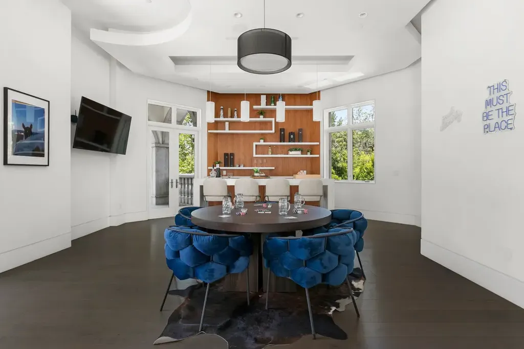 10350 Wyton Drive Home in Los Angeles, California. Experience the ultimate in refined living at 10350 Wyton Drive, a Holmby Hills estate that seamlessly blends grand European-inspired design with modern amenities. Set on 1.5 acres of meticulously landscaped grounds, this stunning property offers palatial interiors, six ensuite bedrooms, twelve baths, and an array of lavish features.