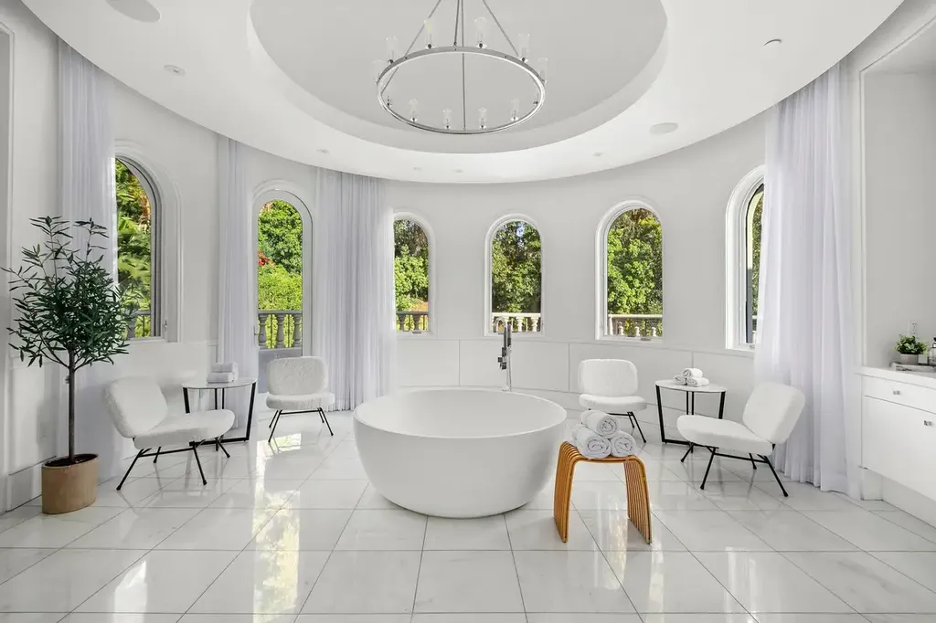 10350 Wyton Drive Home in Los Angeles, California. Experience the ultimate in refined living at 10350 Wyton Drive, a Holmby Hills estate that seamlessly blends grand European-inspired design with modern amenities. Set on 1.5 acres of meticulously landscaped grounds, this stunning property offers palatial interiors, six ensuite bedrooms, twelve baths, and an array of lavish features.