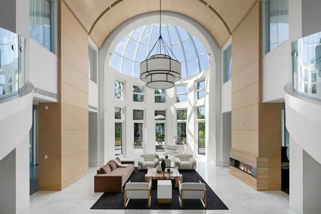 10350 Wyton Drive Home in Los Angeles, California. Experience the ultimate in refined living at 10350 Wyton Drive, a Holmby Hills estate that seamlessly blends grand European-inspired design with modern amenities. Set on 1.5 acres of meticulously landscaped grounds, this stunning property offers palatial interiors, six ensuite bedrooms, twelve baths, and an array of lavish features.