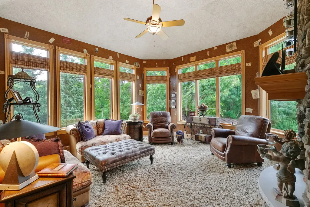 11343 Entrevaux Drive Home in Eden Prairie, Minnesota. Discover the epitome of luxury living in this custom-built Wooddale home, nestled on a serene lot with an extraordinary backyard oasis. The resort-style concrete pool, hot tub, waterfalls, expansive deck, and pergola with a fireplace create an entertainer's dream.