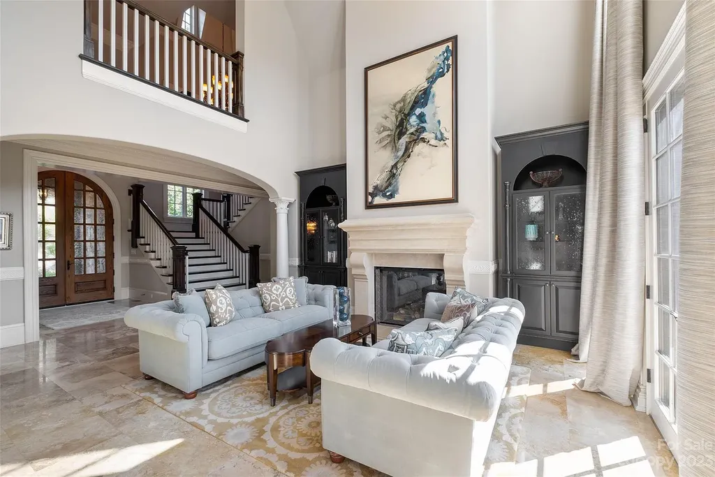 12144 James Jack Lane Home in Charlotte, North Carolina. Discover the epitome of luxury living in this stunning estate nestled on a private cul-de-sac lot with breathtaking views of the 12th and 13th holes of Ballantyne Country Club's finest golf course. 