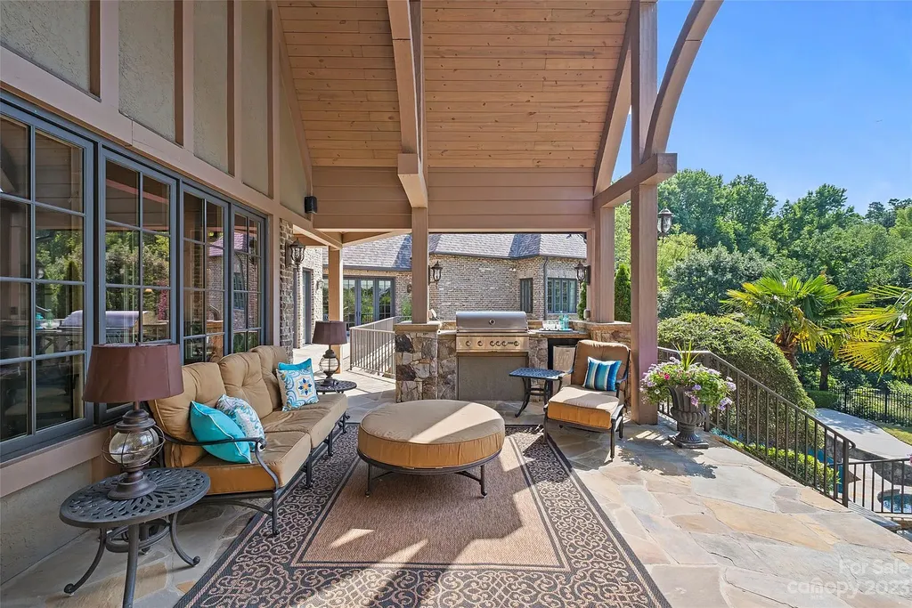 12144 James Jack Lane Home in Charlotte, North Carolina. Discover the epitome of luxury living in this stunning estate nestled on a private cul-de-sac lot with breathtaking views of the 12th and 13th holes of Ballantyne Country Club's finest golf course. 