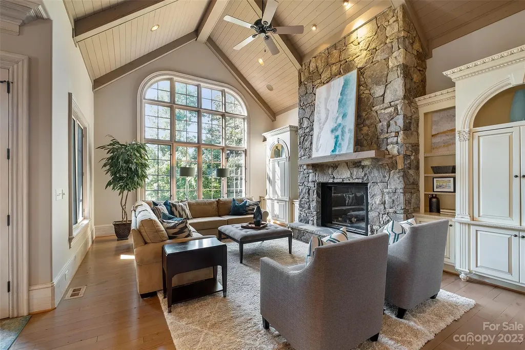 12144 James Jack Lane Home in Charlotte, North Carolina. Discover the epitome of luxury living in this stunning estate nestled on a private cul-de-sac lot with breathtaking views of the 12th and 13th holes of Ballantyne Country Club's finest golf course. 