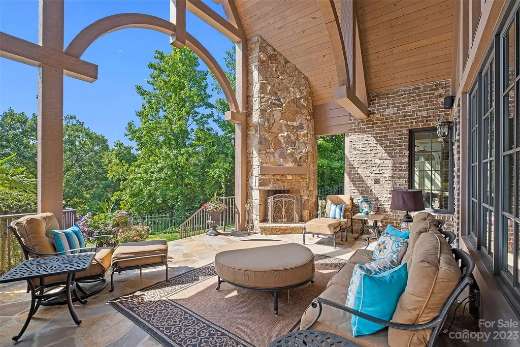 12144 James Jack Lane Home in Charlotte, North Carolina. Discover the epitome of luxury living in this stunning estate nestled on a private cul-de-sac lot with breathtaking views of the 12th and 13th holes of Ballantyne Country Club's finest golf course. 