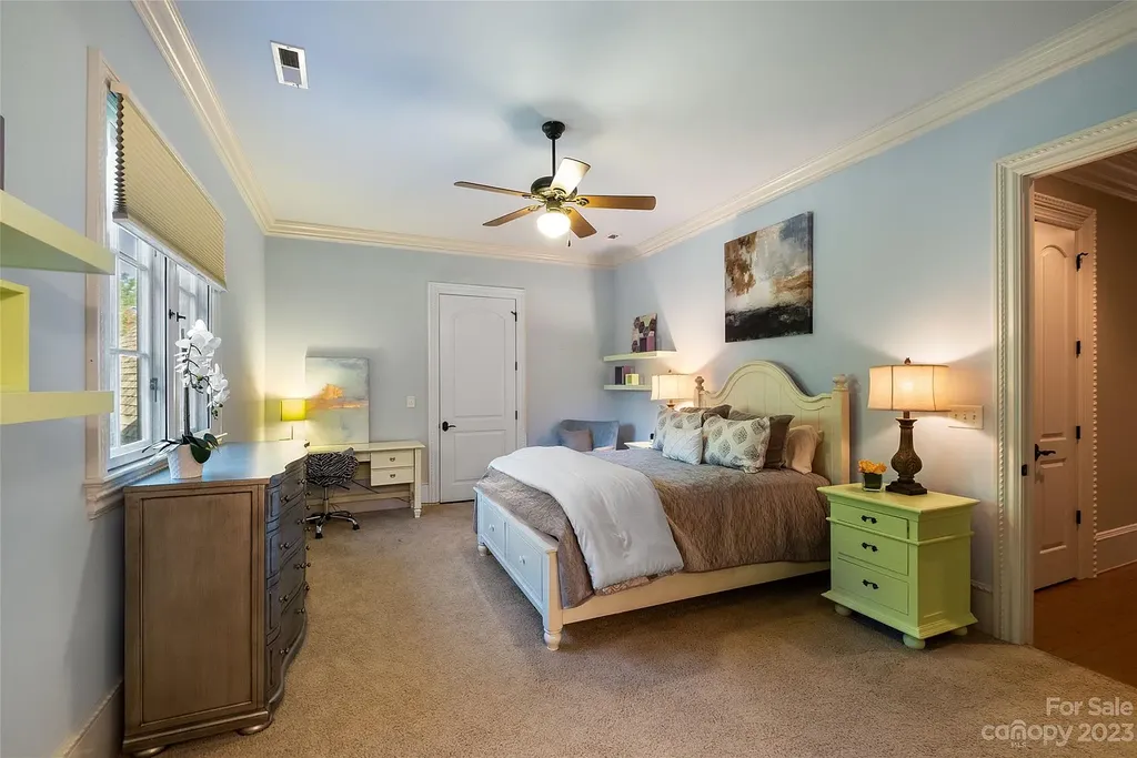 12144 James Jack Lane Home in Charlotte, North Carolina. Discover the epitome of luxury living in this stunning estate nestled on a private cul-de-sac lot with breathtaking views of the 12th and 13th holes of Ballantyne Country Club's finest golf course. 