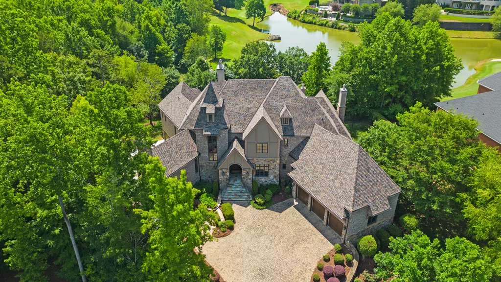 12144 James Jack Lane Home in Charlotte, North Carolina. Discover the epitome of luxury living in this stunning estate nestled on a private cul-de-sac lot with breathtaking views of the 12th and 13th holes of Ballantyne Country Club's finest golf course. 
