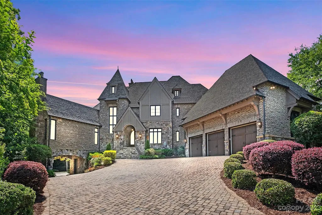12144 James Jack Lane Home in Charlotte, North Carolina. Discover the epitome of luxury living in this stunning estate nestled on a private cul-de-sac lot with breathtaking views of the 12th and 13th holes of Ballantyne Country Club's finest golf course. 