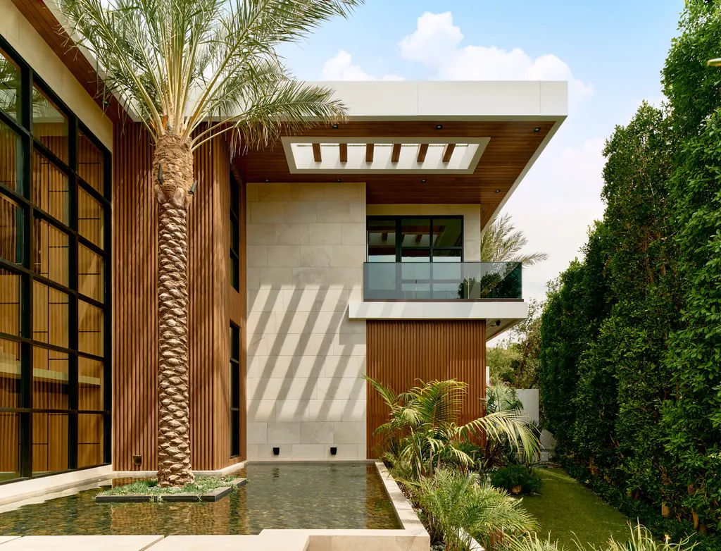 13187 Chalon Road Home in Los Angeles, California. Embrace the epitome of modern luxury living at Allure, a stunning estate designed by award-winning Developer Ramtin Ray Nosrati. Set on 1.3 acres of picturesque California landscape, this idyllic paradise offers resort-quality amenities including a pickleball court, a professional-size basketball/sports court, putting green, and more. 