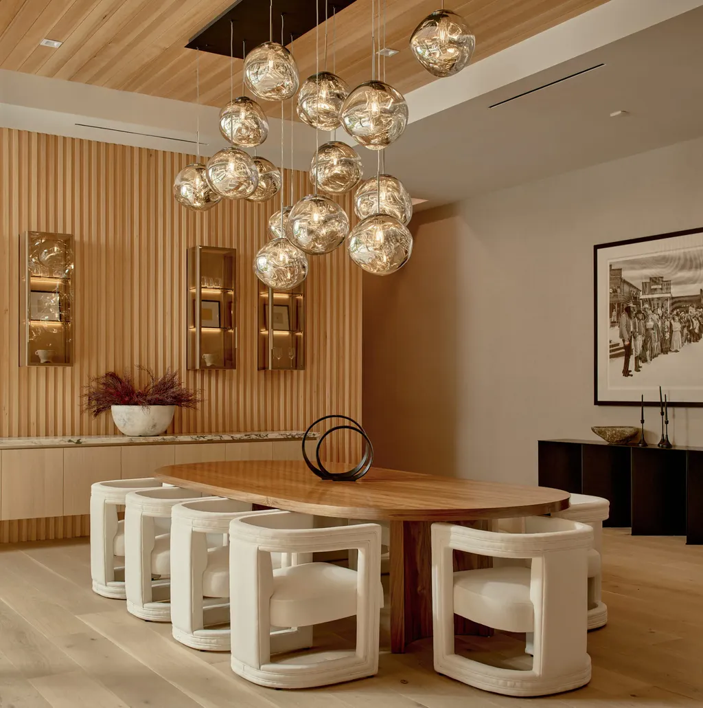 13187 Chalon Road Home in Los Angeles, California. Embrace the epitome of modern luxury living at Allure, a stunning estate designed by award-winning Developer Ramtin Ray Nosrati. Set on 1.3 acres of picturesque California landscape, this idyllic paradise offers resort-quality amenities including a pickleball court, a professional-size basketball/sports court, putting green, and more. 